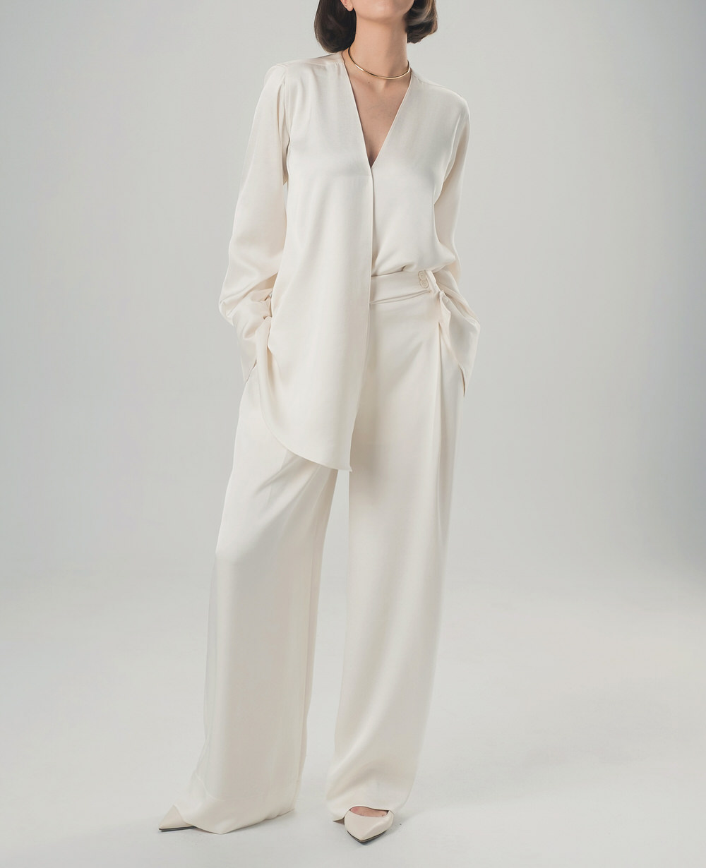 Minimalist ivory set with asymmetric shirt and wide-leg trousers